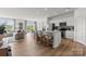 Spacious living room open to the modern kitchen and dining area, perfect for entertaining at 566 Mountain View Dr, Monroe, NC 28110