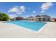 A large, inviting community pool surrounded by a concrete deck, gazebo and pool house at 566 Mountain View Dr, Monroe, NC 28110