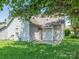 Backyard featuring a green lawn and a patio at 6212 Derryfield Dr, Charlotte, NC 28213