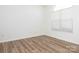 Bright, airy bedroom with natural light and durable wood-look flooring at 6212 Derryfield Dr, Charlotte, NC 28213
