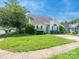 Charming single-Gathering home with a well-maintained lawn and mature shade tree at 6212 Derryfield Dr, Charlotte, NC 28213