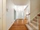 Bright foyer boasts hardwood floors, a staircase, and a view into other rooms at 720 Kingsmill Ln, Clover, SC 29710