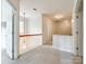 Upstairs hallway with carpet and white trim features open doors and an airy feel at 720 Kingsmill Ln, Clover, SC 29710