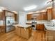 Well-equipped kitchen with wood cabinets, stainless steel appliances, and a central island at 720 Kingsmill Ln, Clover, SC 29710