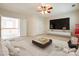 Relaxing living room featuring a TV, comfortable seating, and modern decor at 720 Kingsmill Ln, Clover, SC 29710