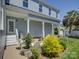 Inviting backyard patio with lush landscaping, perfect for outdoor relaxation and entertaining at 757 Shady Grove Xing, Fort Mill, SC 29708