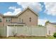 Fenced backyard featuring lush greenery, perfect for outdoor activities and privacy at 8259 Carob Tree Ln, Charlotte, NC 28215