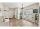Inviting entryway with hardwood floors, window, and a view of the front door at 8259 Carob Tree Ln, Charlotte, NC 28215