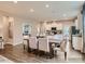 Elegant dining area adjacent to a well-equipped kitchen with stainless steel appliances at 8441 Norman Forest Rd, Lancaster, SC 29720