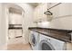 Well-equipped laundry room with granite countertops and ample cabinet space at 8451 Ridgewood Rd, Sherrills Ford, NC 28673