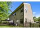 Property showcasing a spacious backyard, a patio, and lush greenery for outdoor enjoyment at 9437 Tavistock Ct, Matthews, NC 28105
