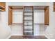 Spacious closet with custom shelving provides ample storage and organization solutions at 1000 E Woodlawn Rd # 408, Charlotte, NC 28209