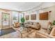 Common area featuring neutral colors, tile floors, and comfortable seating at 1000 E Woodlawn Rd # 408, Charlotte, NC 28209