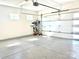 Clean and spacious garage featuring an epoxy floor and ample storage space for vehicles and equipment at 1009 Belmont Ave, Charlotte, NC 28205