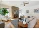 Inviting living room with a modern fireplace, stylish furniture, and abundant natural light creating a cozy atmosphere at 1009 Belmont Ave, Charlotte, NC 28205