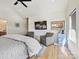 Relaxing main bedroom with seating area, modern decor, and ensuite bathroom at 1009 Belmont Ave, Charlotte, NC 28205
