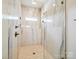 Luxurious shower featuring marble tile and overhead shower head at 1009 Belmont Ave, Charlotte, NC 28205