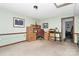 Office with built-in storage, neutral carpet, and stylish decor at 10209 Thomas Payne Cir, Charlotte, NC 28277