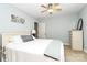 Light and bright bedroom features a ceiling fan and neutral decor at 10209 Thomas Payne Cir, Charlotte, NC 28277