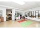 Bright home gym space with mirrored wall, exercise mats, and accessories perfect for a workout routine at 10209 Thomas Payne Cir, Charlotte, NC 28277