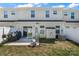 Spacious backyard featuring a patio, grill, and privacy fence, perfect for outdoor entertaining at 10436 Dalton Woods Nw Ct, Huntersville, NC 28078