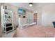 Bedroom featuring plush bedding, a ceiling fan, and white shelving at 10436 Dalton Woods Nw Ct, Huntersville, NC 28078