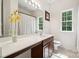 Bathroom featuring vanity, large mirror, tub-shower combo, and tile floors at 109 Braxton Gate Ct, Mount Holly, NC 28120
