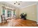 Comfortable office area with natural light, wood flooring, and traditional furnishings at 109 Braxton Gate Ct, Mount Holly, NC 28120
