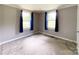 Bedroom featuring neutral walls, a window, and carpeted floors at 1105 S Church S St, Monroe, NC 28112