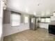 Spacious kitchen with stainless steel appliances, ample counter space, and a convenient access door to the outside at 1105 S Church S St, Monroe, NC 28112