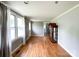 Bright living room with hardwood floors, neutral walls, and natural light from the large window at 1105 S Church S St, Monroe, NC 28112
