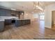 Modern kitchen with an island, recessed lighting, pendant lights, and stainless steel appliances at 11453 Prosperity Church Rd, Huntersville, NC 28078