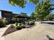 Well-maintained commercial area with a Firestone auto care center, pergola and manicured landscape at 11741 Blessington Rd, Huntersville, NC 28078