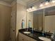 Bathroom with a double sink vanity, granite countertops, and stylish fixtures at 1200 Kent Dr, Lancaster, SC 29720