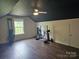 Attic bonus room space with exercise equipment at 1200 Kent Dr, Lancaster, SC 29720