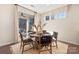 Breakfast nook with a circular table and four chairs with a view of the patio at 13251 Chopin Ridge Rd, Huntersville, NC 28078