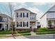 Charming two-story home features a well-maintained front yard and classic architectural details at 13818 Jacks Ln, Pineville, NC 28134