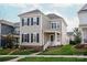 Charming two-story home with neat landscaping and a welcoming porch at 13818 Jacks Ln, Pineville, NC 28134