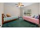 Bedroom with green carpet, two beds and a window view at 140 Ribbon Cir, Lincolnton, NC 28092