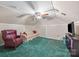 Attic bonus room featuring a recliner, sofa and tv at 140 Ribbon Cir, Lincolnton, NC 28092