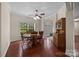 Dining room with a ceiling fan and window to provide natural light at 140 Ribbon Cir, Lincolnton, NC 28092