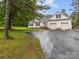 Charming home with an attached two-car garage and spacious front yard at 140 Ribbon Cir, Lincolnton, NC 28092