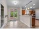 Breakfast nook with a door to the deck, open to a functional kitchen with countertops and cabinets at 140 Ribbon Cir, Lincolnton, NC 28092