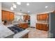 Well-lit kitchen featuring wooden cabinets, granite countertops, and stainless steel appliances at 140 Ribbon Cir, Lincolnton, NC 28092
