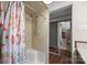 Shower stall with floral curtain at 140 Ribbon Cir, Lincolnton, NC 28092