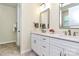 Beautiful bathroom with dual sinks, modern vanity, and ample counter space, providing comfort and style at 16019 Kelby Cv, Charlotte, NC 28278