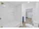 Modern bathroom featuring marble-look shower and tiled floors at 1712 S Main St, Salisbury, NC 28144