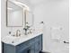 Stylish bathroom featuring a blue double sink vanity and modern fixtures at 1712 S Main St, Salisbury, NC 28144