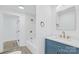 Modern bathroom features a new vanity, tub, and a tiled walk-in shower at 1712 S Main St, Salisbury, NC 28144