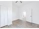 Bright bedroom with wood-look floors and a closet at 1712 S Main St, Salisbury, NC 28144